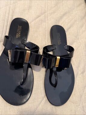 Michael Kors Black Patent Bow Thong Sandals with Gold Hardware